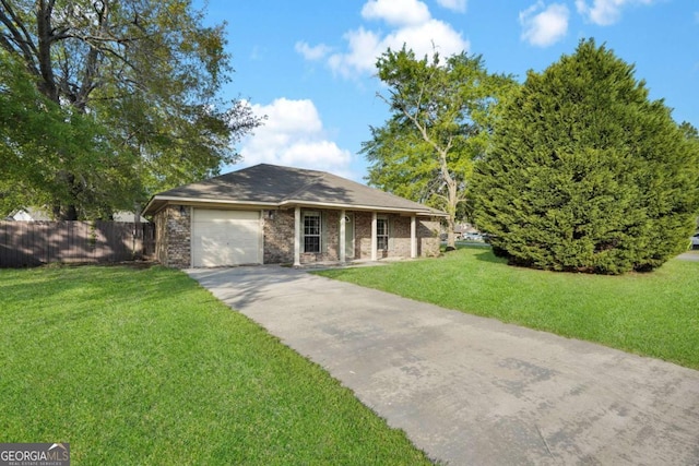 210 Preakness Dr, Hinesville, GA 31313 - single story home featuring concrete driveway, a garage, fence, and a front lawn