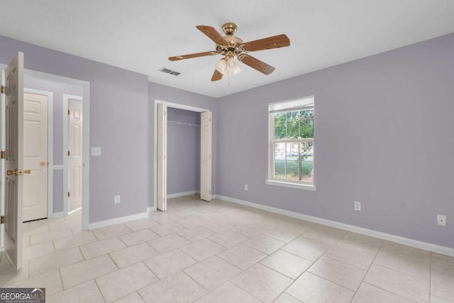 210 Preakness Dr, Hinesville, GA 31313 - unfurnished bedroom with a closet, a ceiling fan, visible vents, light tile patterned flooring, and baseboards