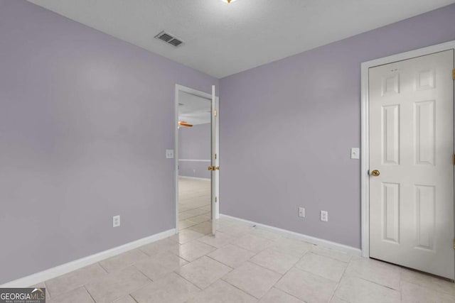 210 Preakness Dr, Hinesville, GA 31313 - unfurnished bedroom with visible vents, baseboards, and light tile patterned flooring