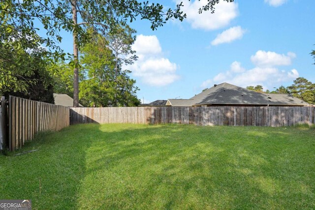 210 Preakness Dr, Hinesville, GA 31313 - view of yard with a fenced backyard