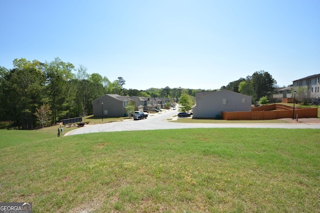 view of yard featuring a residential view