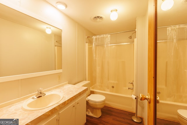 full bath with wood finished floors, visible vents, toilet, and shower / bath combination with curtain