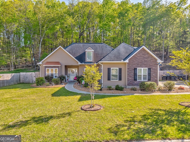 11 Bush Arbor Pl SW, Rome, GA 30165 - view of front of home with stone siding, fence, and a front lawn