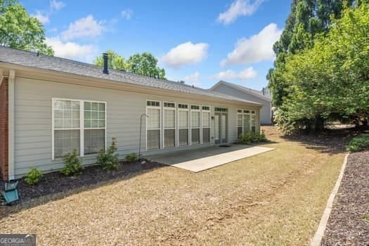 1330 Badingham Dr, Cumming, GA 30041 - back of house featuring a patio area