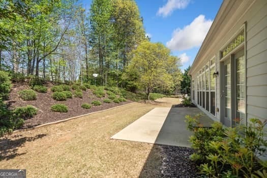 1330 Badingham Dr, Cumming, GA 30041 - view of yard with a patio