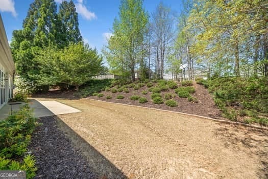1330 Badingham Dr, Cumming, GA 30041 - view of yard featuring a patio area