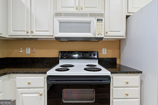 kitchen with white cabinets and white appliances