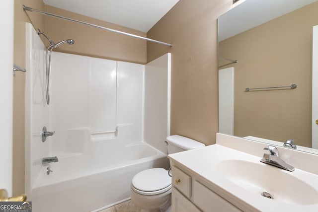bathroom featuring toilet, vanity, and shower / bathtub combination