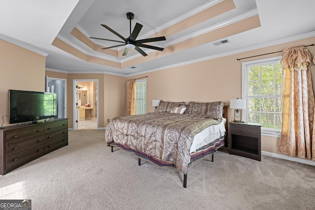 1035 Bridle Path Dr, Lawrenceville, GA 30045 - carpeted bedroom with a raised ceiling, crown molding, ceiling fan, and ensuite bathroom