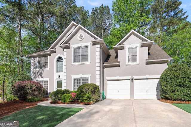 1035 Bridle Path Dr, Lawrenceville, GA 30045 - view of front of home featuring stucco siding and concrete driveway