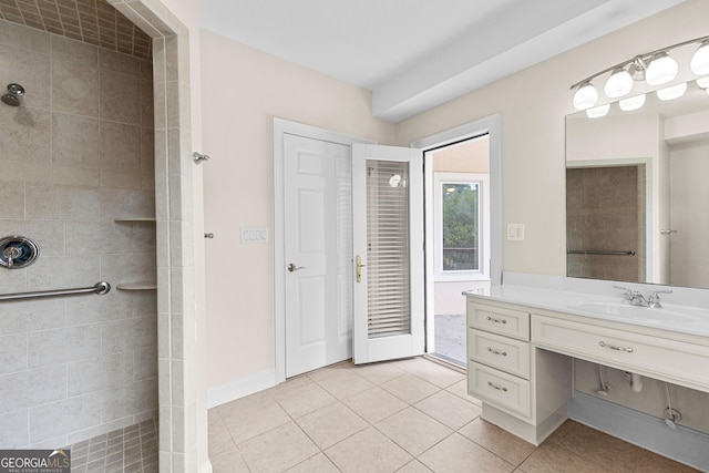 12 Arbor Shrs, Newnan, GA 30265 - bathroom featuring vanity, a tile shower, and tile patterned floors