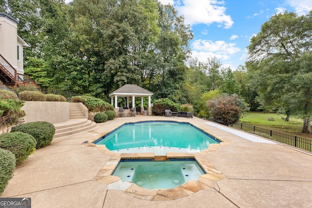 12 Arbor Shrs, Newnan, GA 30265 - view of pool with a gazebo, an in-ground hot tub, a patio, stairway, and view of scattered trees
