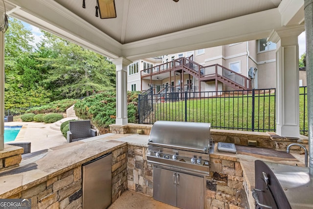 12 Arbor Shrs, Newnan, GA 30265 - view of patio / terrace featuring exterior kitchen and a ceiling fan