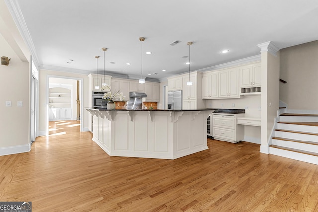 12 Arbor Shrs, Newnan, GA 30265 - kitchen featuring appliances with stainless steel finishes, light wood-style floors, dark countertops, a kitchen bar, and ornamental molding