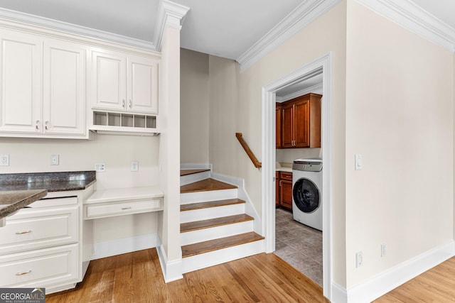 12 Arbor Shrs, Newnan, GA 30265 - stairs with washer / clothes dryer, wood finished floors, and ornamental molding