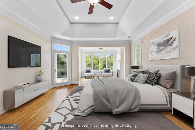 12 Arbor Shrs, Newnan, GA 30265 - bedroom with a raised ceiling, access to outside, multiple windows, wood finished floors, and crown molding