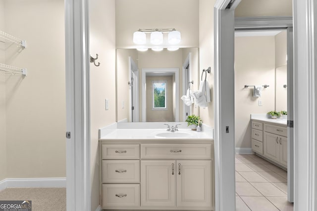 12 Arbor Shrs, Newnan, GA 30265 - bathroom featuring vanity, tile patterned floors, and a spacious closet