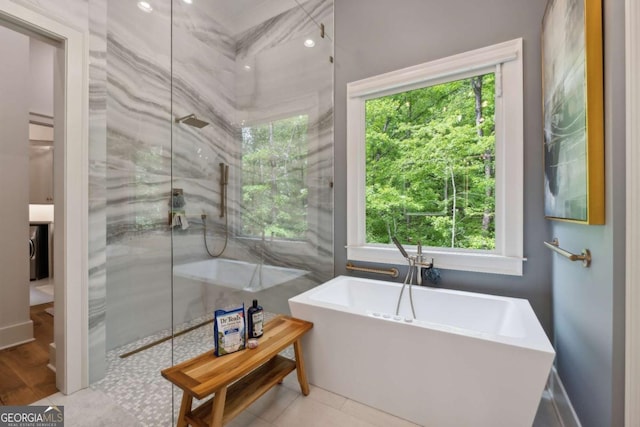 448 Golden Bear Pass, Dahlonega, GA 30533 - full bath featuring a freestanding bath and tile patterned flooring