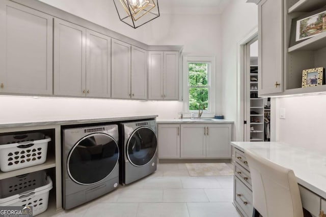 448 Golden Bear Pass, Dahlonega, GA 30533 - laundry area featuring washing machine and dryer, cabinet space, and light tile patterned floors