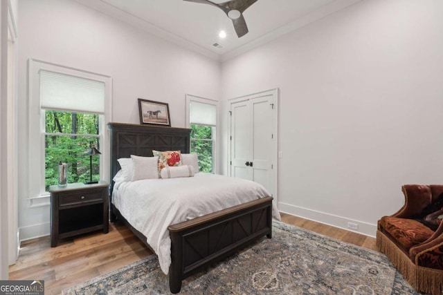 448 Golden Bear Pass, Dahlonega, GA 30533 - bedroom with baseboards, light wood-type flooring, and ceiling fan