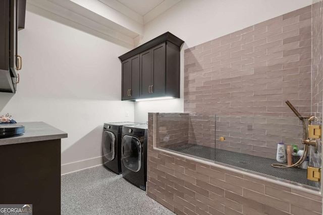 448 Golden Bear Pass, Dahlonega, GA 30533 - washroom featuring baseboards, cabinet space, and washer and clothes dryer