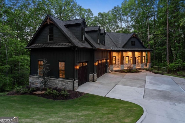 448 Golden Bear Pass, Dahlonega, GA 30533 - craftsman-style house with concrete driveway, a porch, stone siding, and board and batten siding