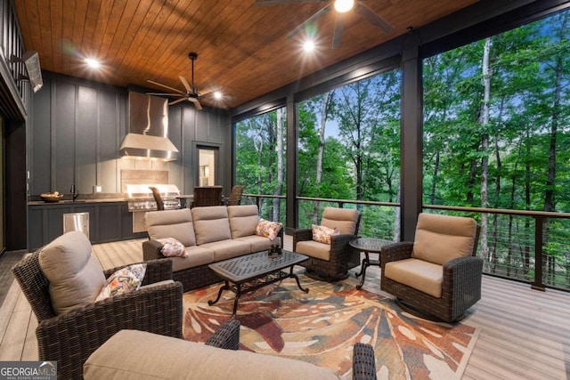 448 Golden Bear Pass, Dahlonega, GA 30533 - sunroom with ceiling fan, exterior kitchen, and outdoor lounge area