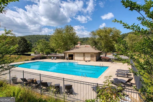 448 Golden Bear Pass, Dahlonega, GA 30533 - community pool featuring a patio