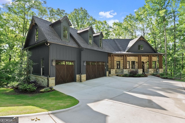 448 Golden Bear Pass, Dahlonega, GA 30533 - modern inspired farmhouse featuring covered porch, an attached garage, stone siding, driveway, and a shingled roof