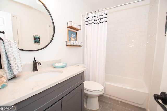 full bathroom featuring shower / tub combo, toilet, and vanity