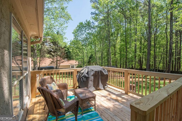 deck featuring a grill