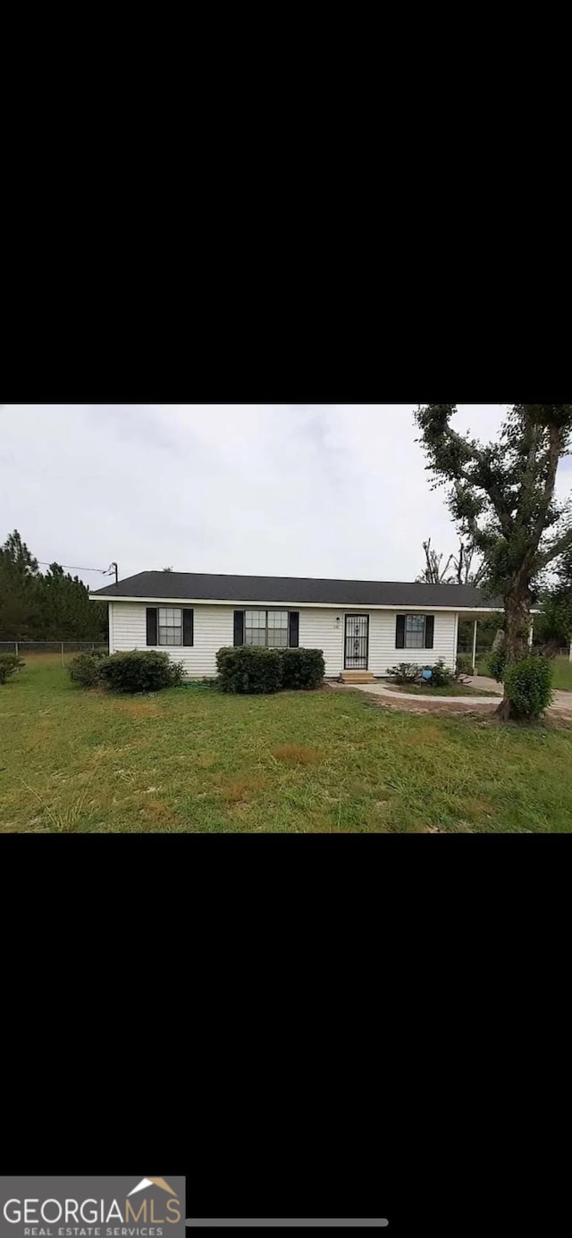 408 Railroad Ave, East Dublin, GA 31027 - ranch-style house featuring a front lawn