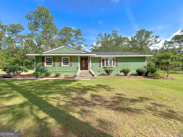 3411 Ponderosa Rd, Portal, GA 30450 - single story home with a front yard and board and batten siding