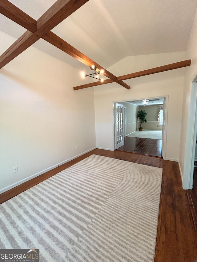 3411 Ponderosa Rd, Portal, GA 30450 - unfurnished room with dark wood-type flooring, a chandelier, and healthy amount of natural light