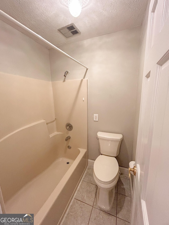 3411 Ponderosa Rd, Portal, GA 30450 - full bath with shower / washtub combination, tile patterned flooring, and a textured ceiling