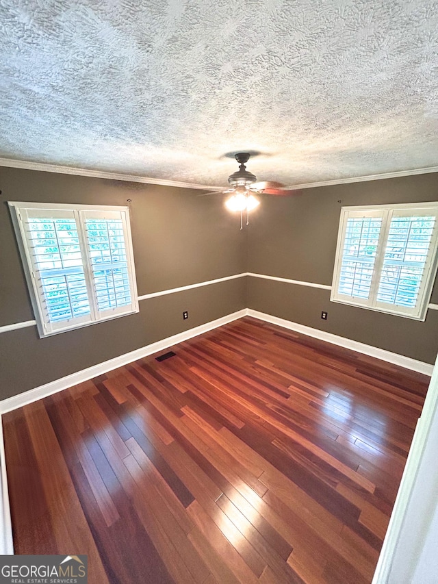 3411 Ponderosa Rd, Portal, GA 30450 - unfurnished room featuring ceiling fan, crown molding, hardwood / wood-style floors, and a textured ceiling