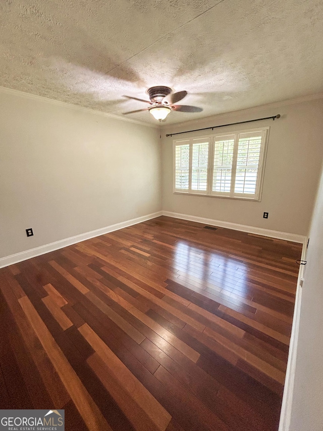 3411 Ponderosa Rd, Portal, GA 30450 - unfurnished room featuring a textured ceiling, ceiling fan, dark wood finished floors, and crown molding