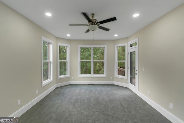 6048 Golf View Xing, Locust Grove, GA 30248 - unfurnished room featuring ceiling fan, dark carpet, and recessed lighting