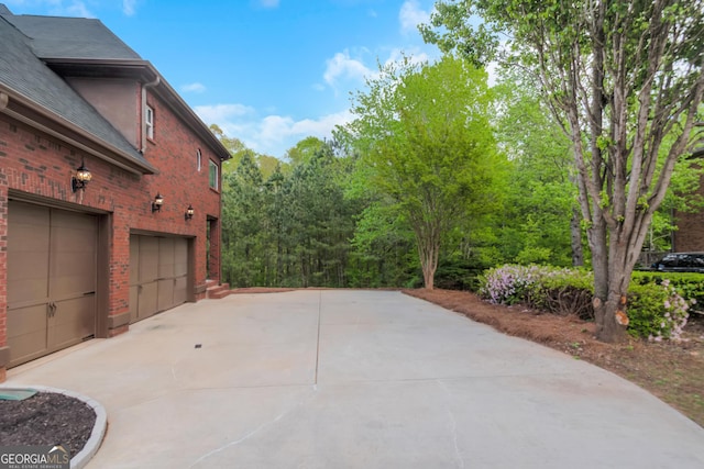 6048 Golf View Xing, Locust Grove, GA 30248 - view of patio with driveway