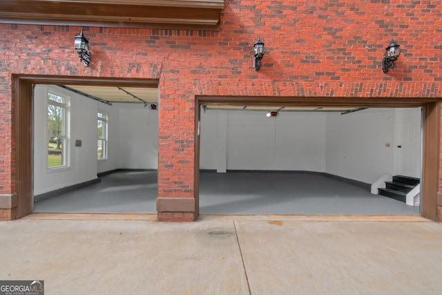 6048 Golf View Xing, Locust Grove, GA 30248 - garage featuring concrete driveway