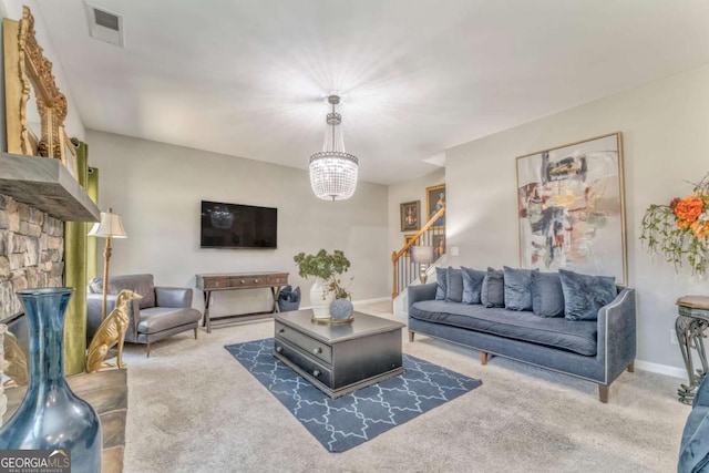 1302 Gardenia Ct, Villa Rica, GA 30180 - carpeted living area with stairway, visible vents, baseboards, and an inviting chandelier