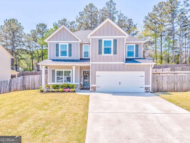 1302 Gardenia Ct, Villa Rica, GA 30180 - craftsman house with board and batten siding, an attached garage, fence, and a front lawn