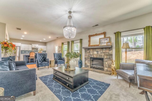 1302 Gardenia Ct, Villa Rica, GA 30180 - living area featuring a fireplace, carpet flooring, and visible vents