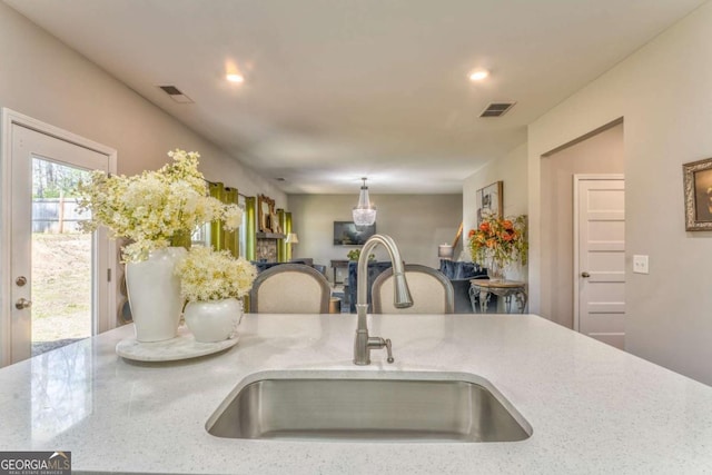 1302 Gardenia Ct, Villa Rica, GA 30180 - kitchen with recessed lighting, visible vents, and a sink