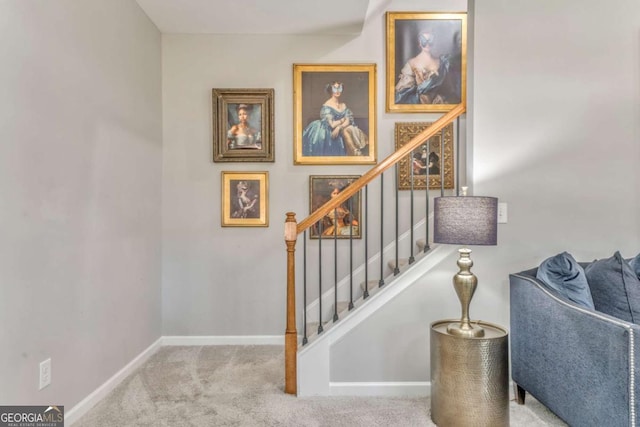 1302 Gardenia Ct, Villa Rica, GA 30180 - stairway featuring baseboards and carpet floors