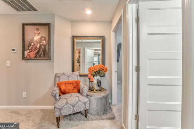 1302 Gardenia Ct, Villa Rica, GA 30180 - sitting room featuring visible vents, baseboards, and carpet