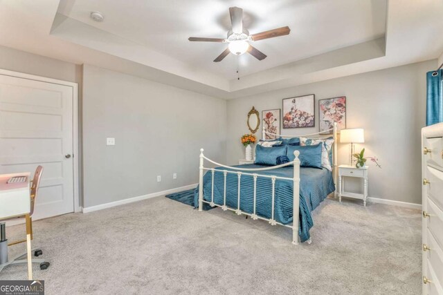 1302 Gardenia Ct, Villa Rica, GA 30180 - bedroom featuring baseboards, a raised ceiling, ceiling fan, and carpet