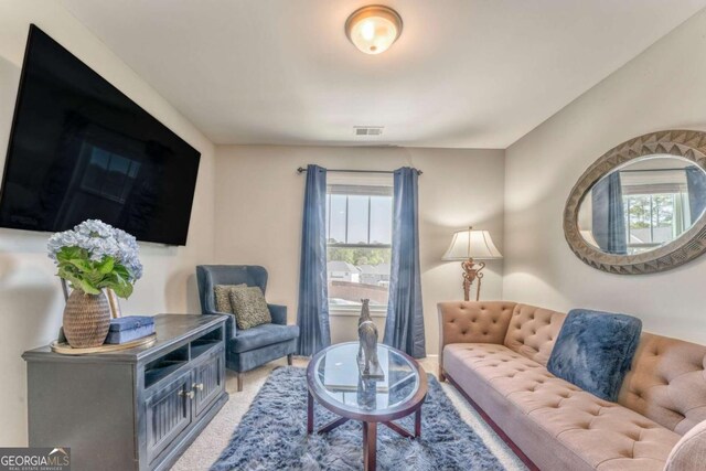 1302 Gardenia Ct, Villa Rica, GA 30180 - carpeted living room with visible vents