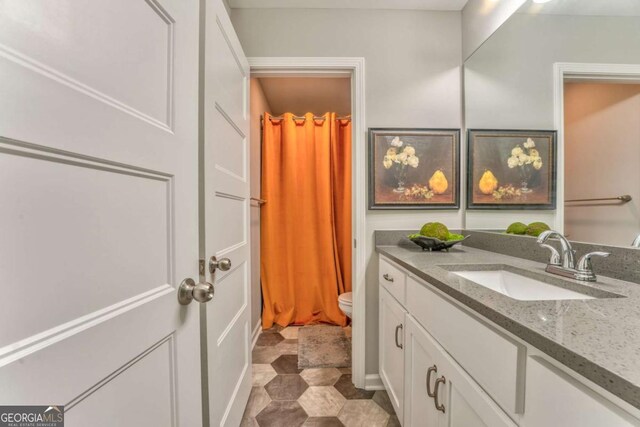 1302 Gardenia Ct, Villa Rica, GA 30180 - bathroom with vanity and toilet