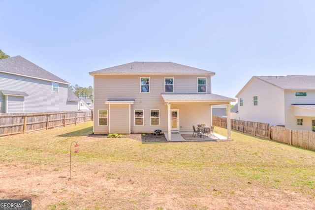 1302 Gardenia Ct, Villa Rica, GA 30180 - back of property with a patio area, a fenced backyard, and a yard